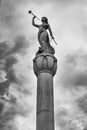 Black and white of The Call to Arms, a 17-foot bronze statue of the Goddess Columbia. She stands