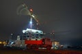 Truck against contruction site with cranes Royalty Free Stock Photo