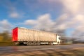 Truck on asphalt road motion blur