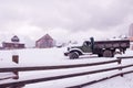 Truck in the backyard. Wooden fence. Village in winter Royalty Free Stock Photo