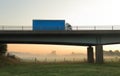 Truck on the bridge in the misty morning Royalty Free Stock Photo