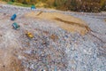 Truck brought household waste landfill, recycling and separation, aerial top view landfill background. Concept Royalty Free Stock Photo