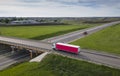 Truck with Cargo Semi Trailer Moving on Road in Direction. Highway intersection junction. Aerial Top View Royalty Free Stock Photo