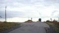 Truck carries the earth on the road