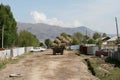 Truck carrying hay bales in Kyrgyzstan