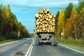 Truck carrying wood on highway Royalty Free Stock Photo