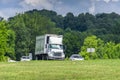 Truck and Cars Merge Onto Freeway on Hot Summer Day