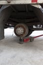 Truck change wheels using a lifting jack