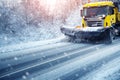 Truck cleaning on winter road covered with snow Royalty Free Stock Photo