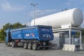 A truck of the company Reinert Logistic GmbH  at an LNG filling station Royalty Free Stock Photo