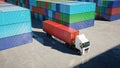 Truck in container depot, wharehouse, seaport. Cargo containers. Logistic and business concept. 3d rendering.