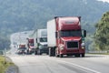 Truck Convoy Traveling On Highway Royalty Free Stock Photo