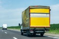 Truck on country highway under blue sky Royalty Free Stock Photo