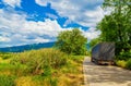 Truck on country road in summer scenery Bulgaria Royalty Free Stock Photo