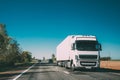 Truck On Country Road. Tractor Unit, Prime Mover, Traction Unit In Motion On Countryside Road In Europe. Business Royalty Free Stock Photo