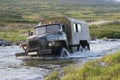 Truck crossing a river