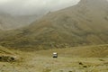 Truck in a deserted mountainous area Royalty Free Stock Photo