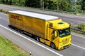Truck with DHL curtainside trailer Royalty Free Stock Photo