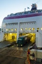 Truck disembarking from docked ship