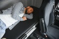 Truck driver enjoying comfortable cabin bed inside his truck Royalty Free Stock Photo