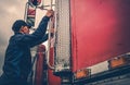 Truck Driver Getting Into Truck Royalty Free Stock Photo