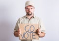 Truck Driver Holding Go Vote Sign