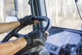 Truck driver keeps driving wheel with both hands