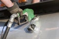 Truck driver pumping gas Royalty Free Stock Photo