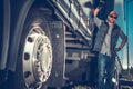 Truck Driver Between Trailers Royalty Free Stock Photo