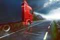 Truck drives during rain