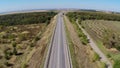 Truck driving along empty freeway in Russia. Aerial drone view. Royalty Free Stock Photo