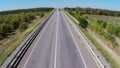 Truck driving along empty freeway in Russia. Aerial drone view. Royalty Free Stock Photo