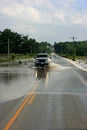 Truck Driving on Flooded Road
