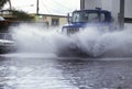Truck Driving Through Flooded Street Royalty Free Stock Photo