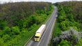 Truck driving on the highway, aerial.