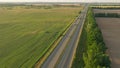 Truck driving highway sun sunset road transport forest field aerial