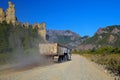 Truck in dust road