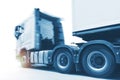Truck Fast Speeding Motion. Semi Trailer Truck Driving on the Raod. Shipping Trucks. Lorry Tractor Industry Freight Truck Logistic Royalty Free Stock Photo