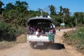 A truck filled with local people on a dirt road close to Chaung Thar, Irrawaddy, Myanmar Royalty Free Stock Photo