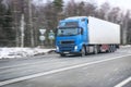 Truck goes on winter road Royalty Free Stock Photo