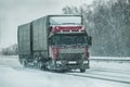 truck goes on winter road Royalty Free Stock Photo