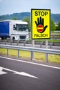 Truck on the highway in the austrian countryside with the STOP/ FALSCH stop / false sign to warn the drivers Royalty Free Stock Photo