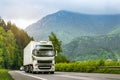 Truck on highway in the highlands Royalty Free Stock Photo