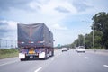 Truck on highway road, sky background, cargo transportation concept