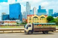 Truck on highway, Singapore cityscape Royalty Free Stock Photo