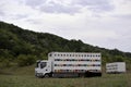 Truck with hives in the glade. car for transporting beehives