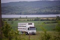 Truck with hives in the glade. car for transporting beehives