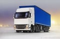 Truck on ice road in snow-storm Royalty Free Stock Photo