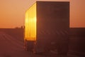 A truck on Interstate 70 at sunset in Kansas