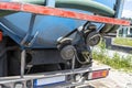 A truck with a large tank for pumping out a septic tank, visible closed flange connection.